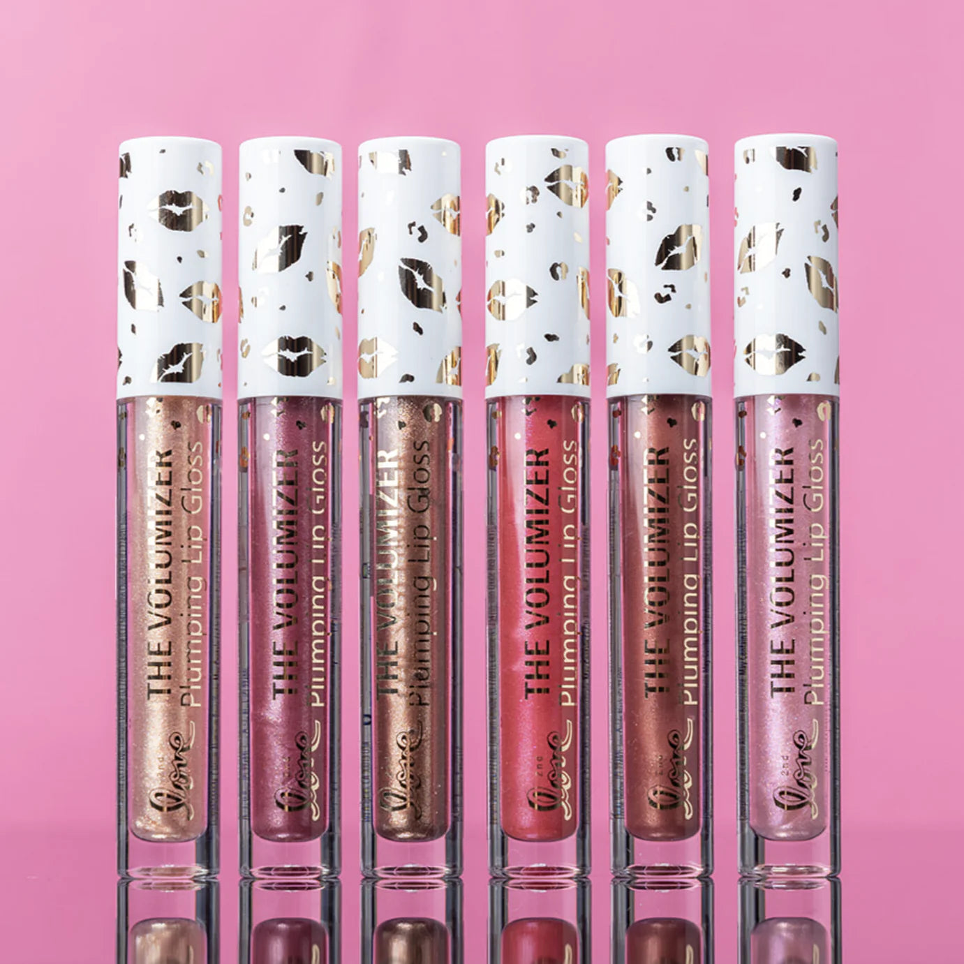 THE VOLUMIZER PLUMPING LIP GLOSS